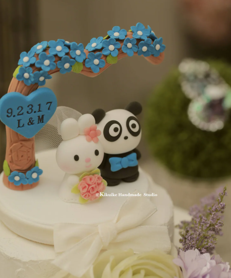 panda and bunny wedding cake topper