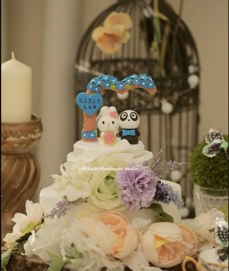 panda and bunny wedding cake topper